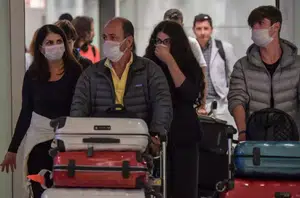 Brasileiros no aeroporto(Nelson Almeida/AFP)