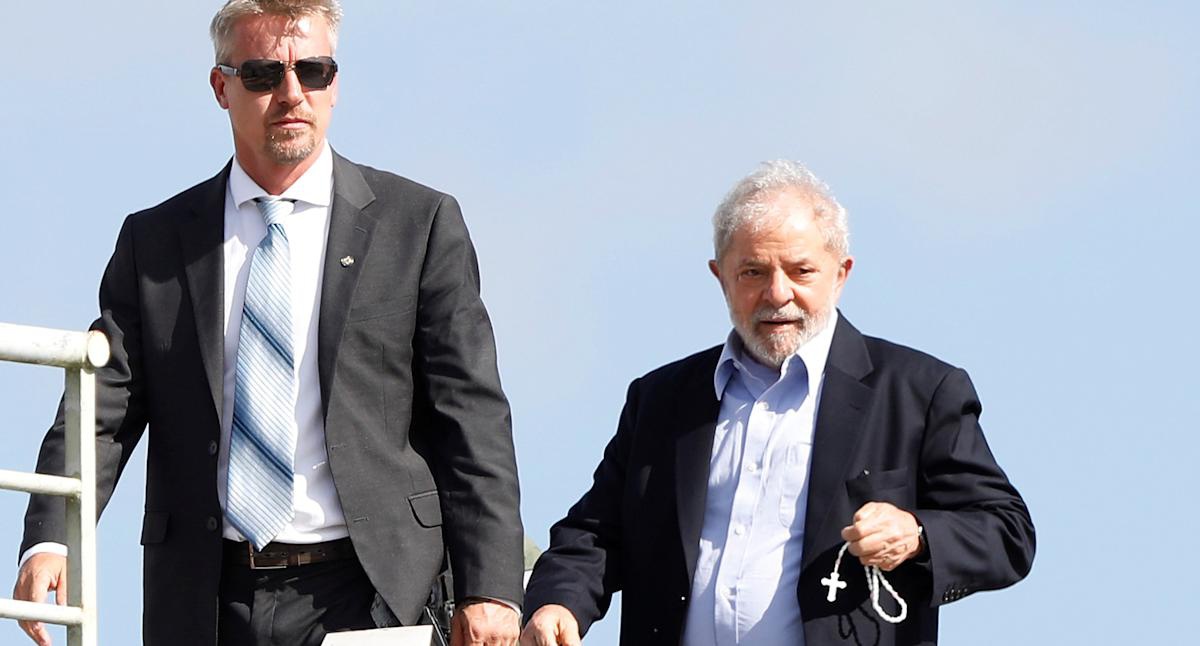 O agente Jorge Chastalo Filho e o ex-presidente Lula