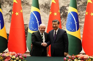 Lula e Xi Jinping em Pequim, na China(Ken Ishii / AFP)