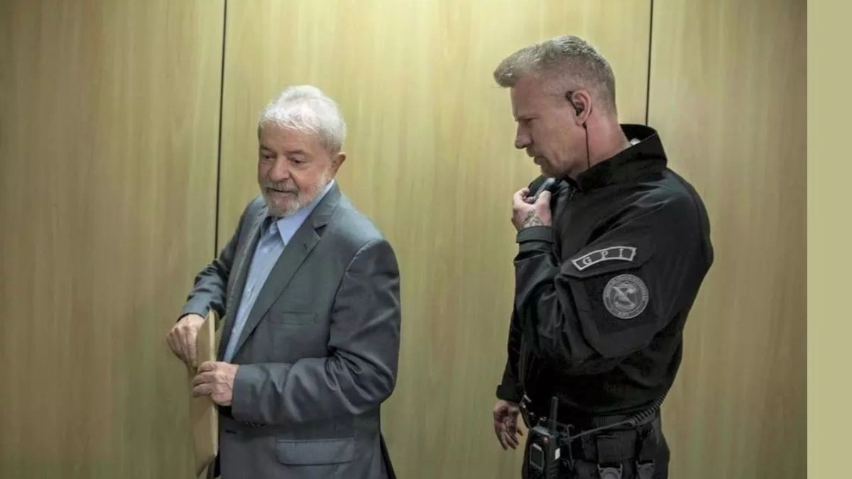 O agente da Polícia Federal Jorge Chastalo e Lula